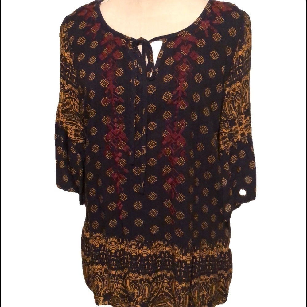 Skies are blue peasant style blouse. Small